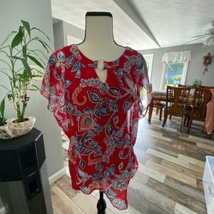 2 tops one Beige end light brown 1 red blue with flowers prints